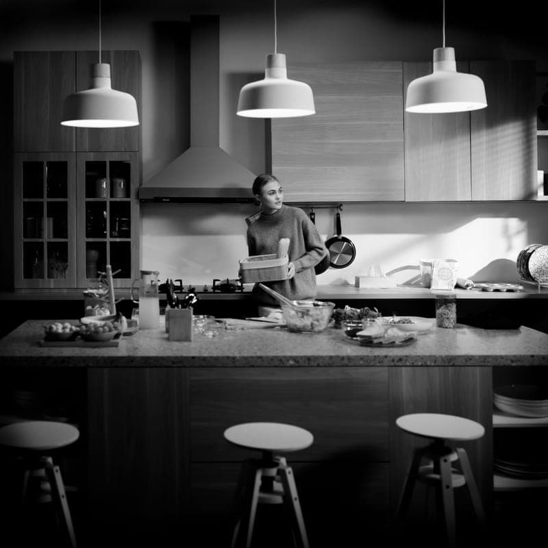 A countertop food waste recycling appliance in a kitchen