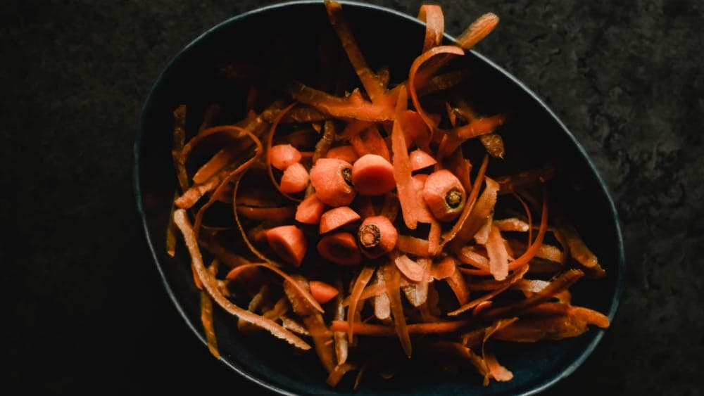 Vegetable peelings collected in a compost bucket